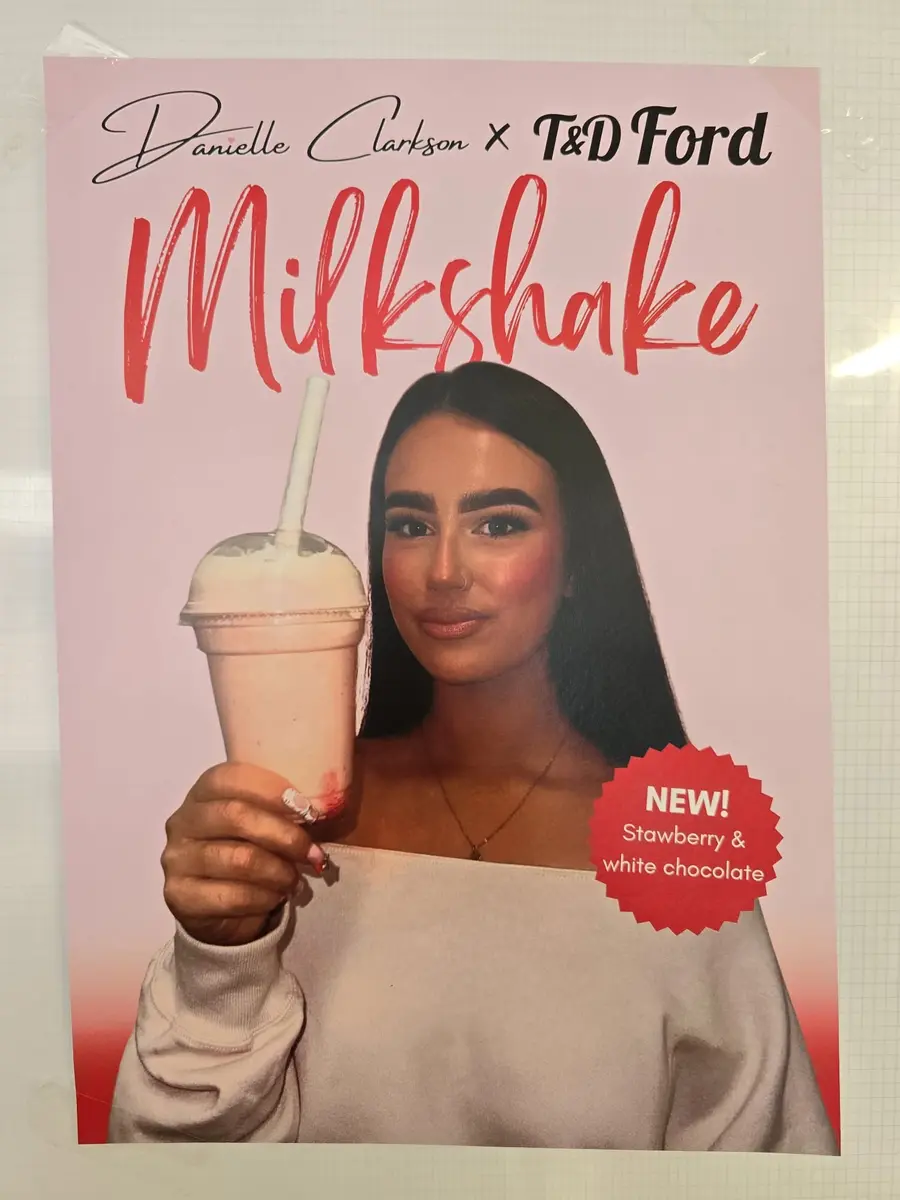 The Danielle Clarkson x T&D Ford milkshake poster in the shop.