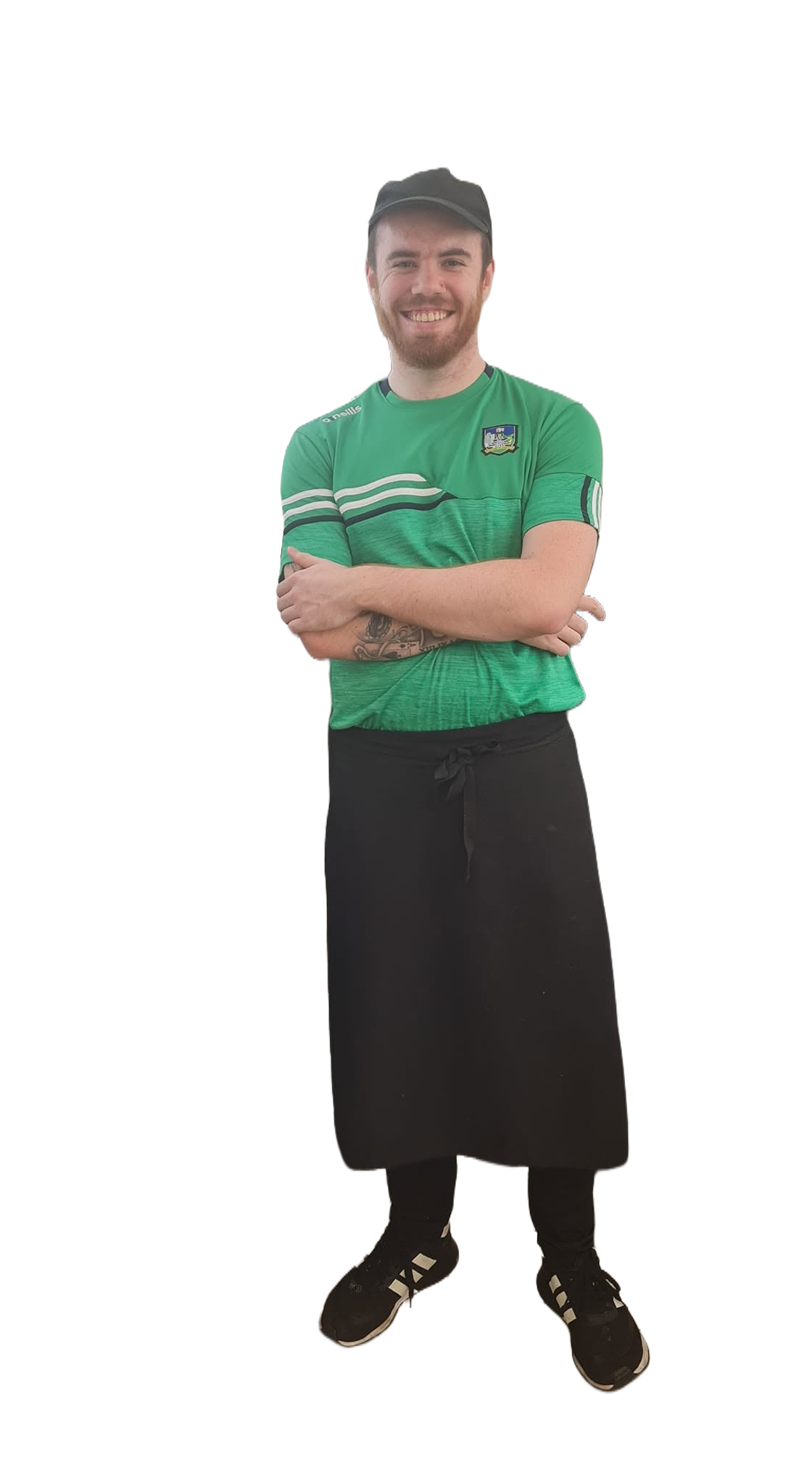 A member of the T & D Ford Fish and Chips staff in a Limerick GAA jersey and shop apron.
